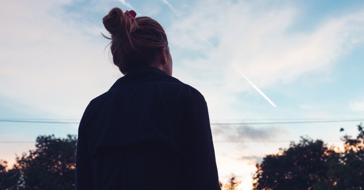a woman looking up, why we need to be persistent
