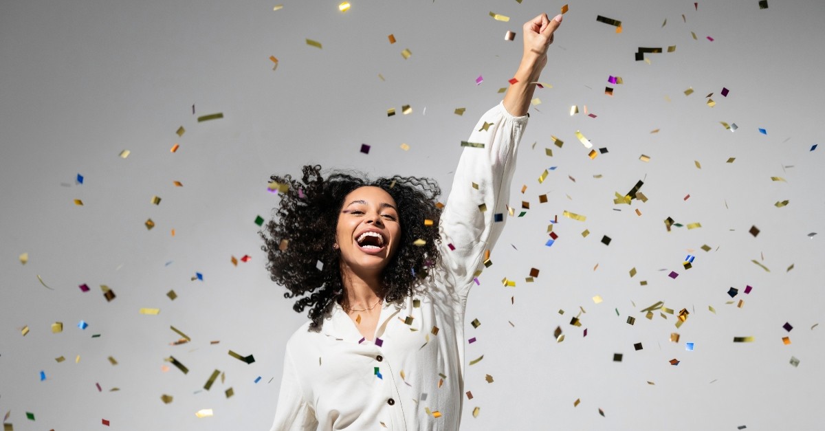 Woman throwing confetti