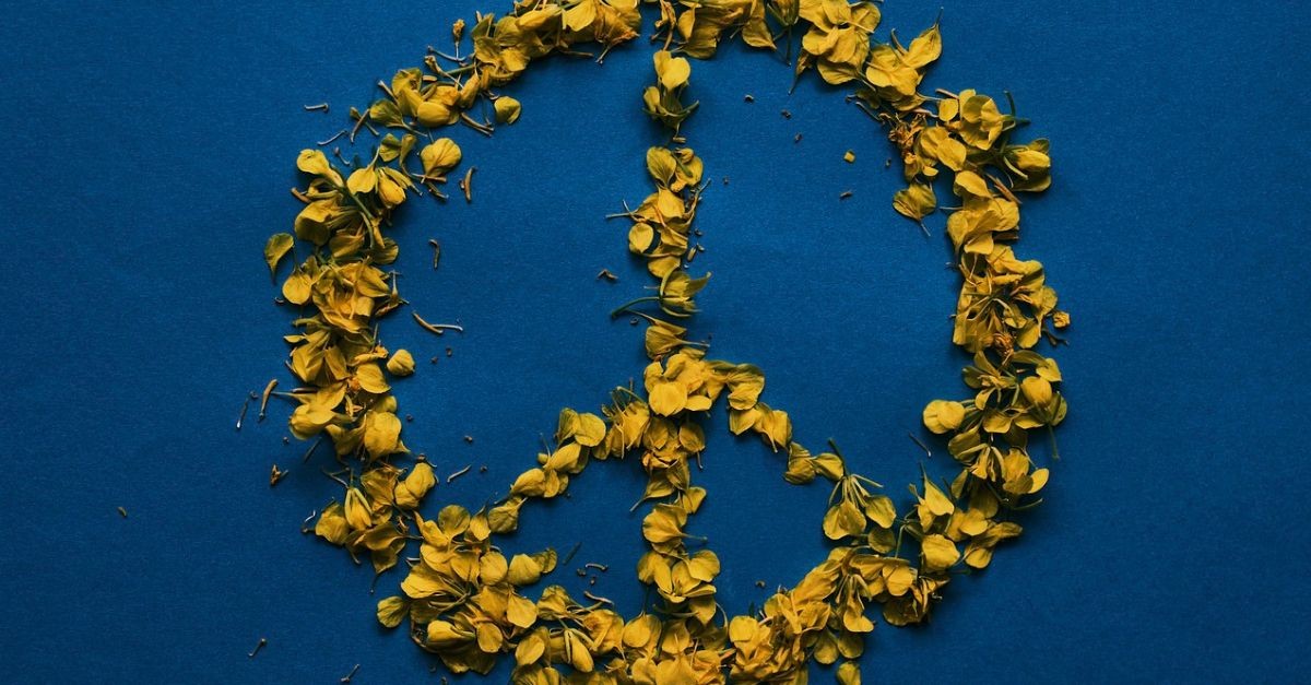 Peace sign made of flowers; Easter promises peace.