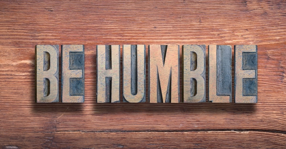 wood block that says "be humble" to represent things that strong christian men do