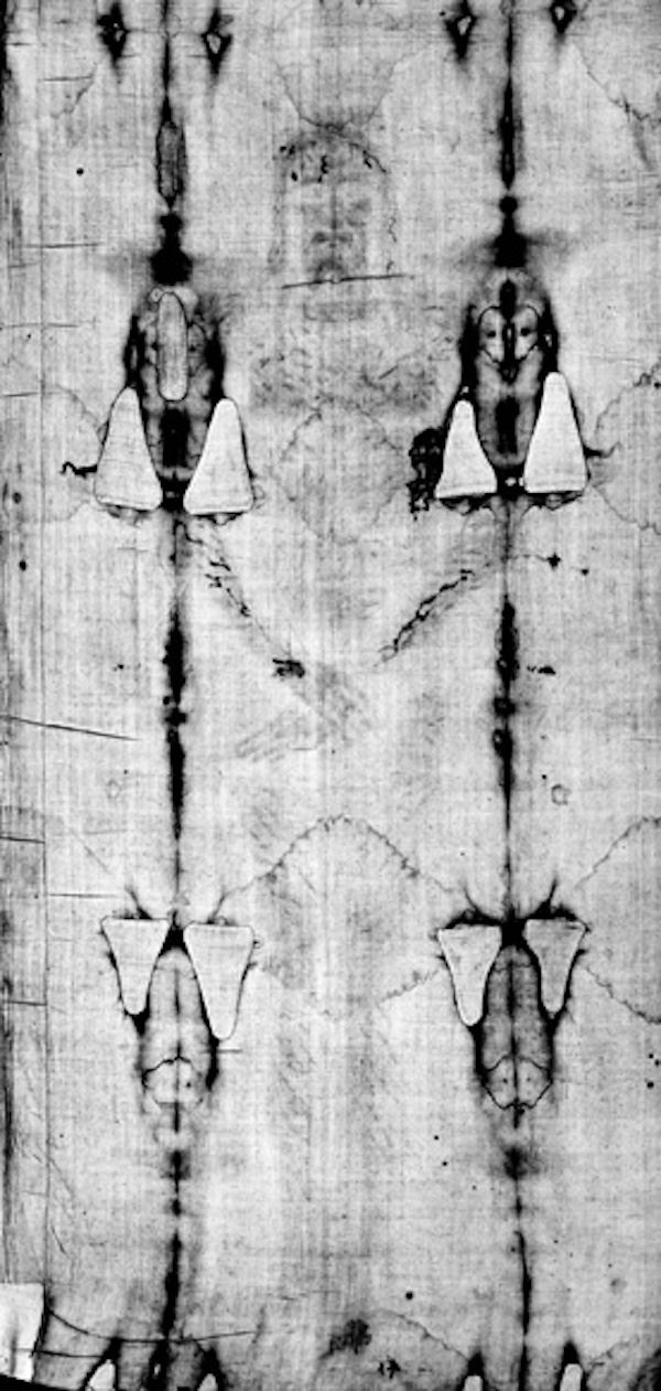 black and white photo of burned shroud of turin